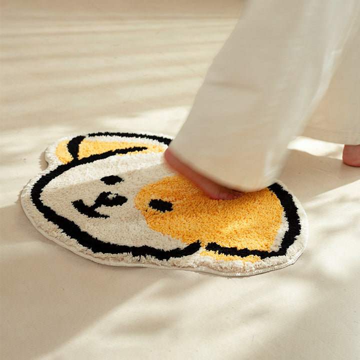Playful children's rug in cheese shape with tufted chenille surface and non-slip backing Kalsten