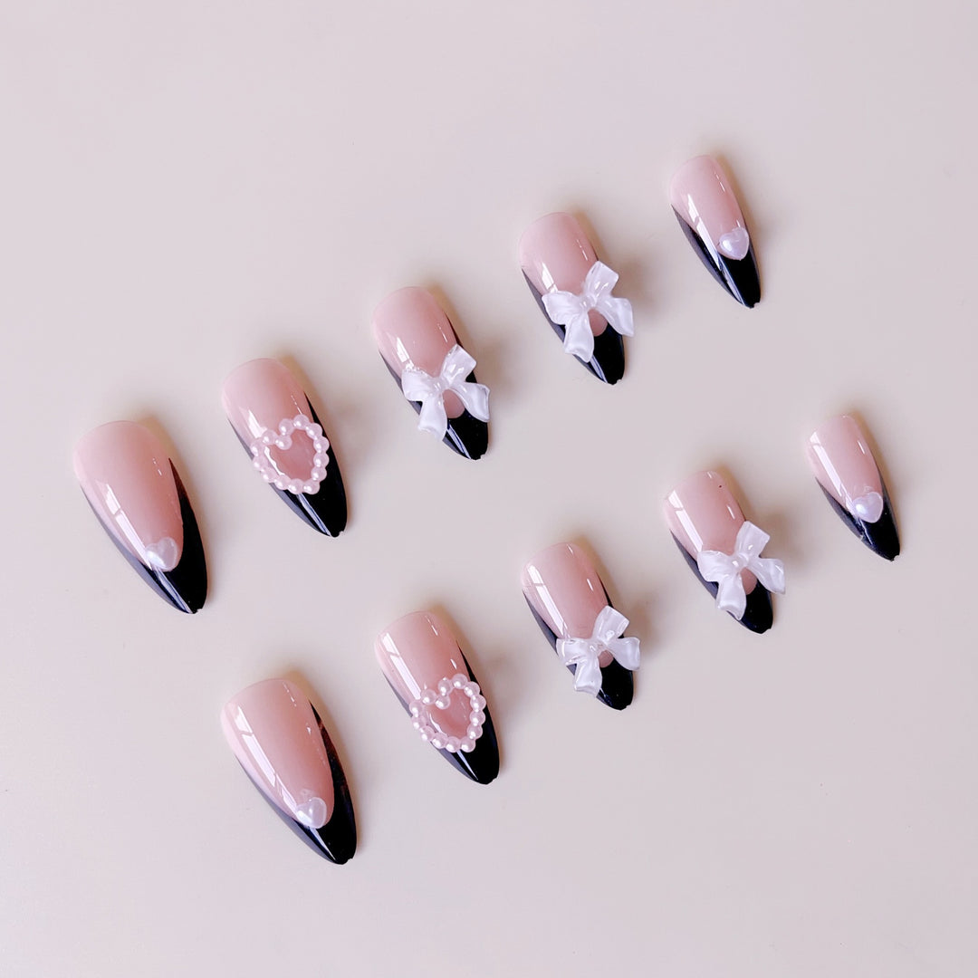Glamorous artificial nail tips with 3D bows and heart decorations Kalsten