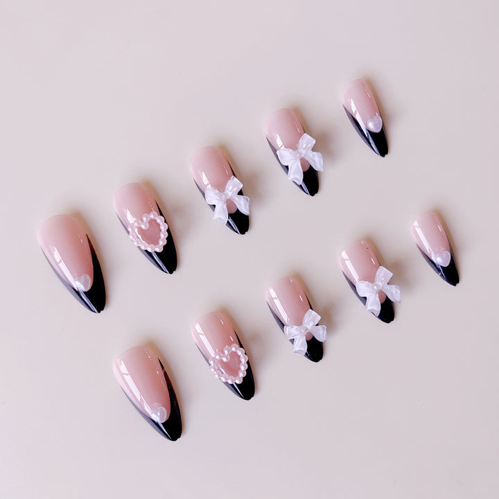Glamorous artificial nail tips with 3D bows and heart decorations Kalsten