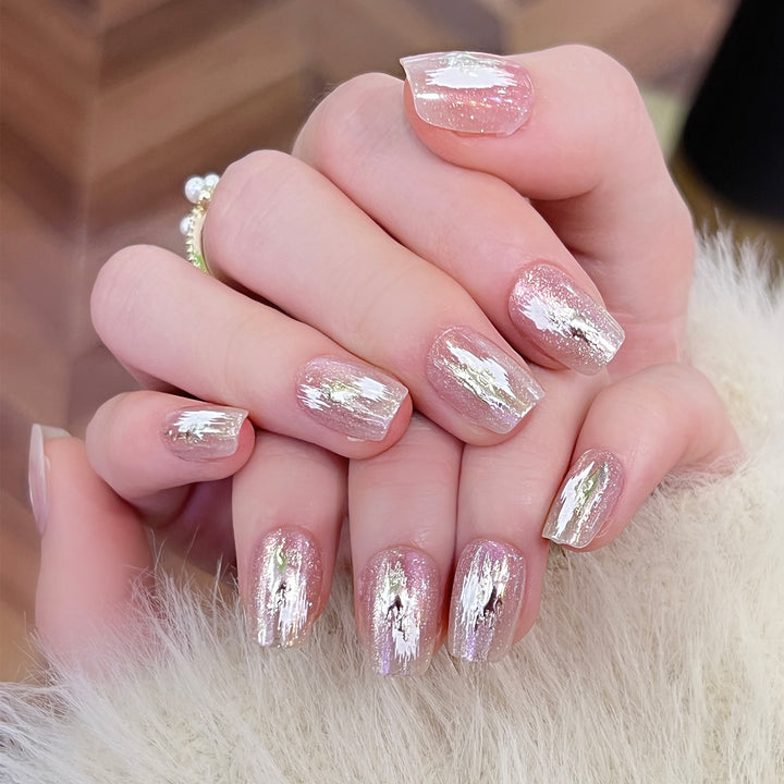 Artificial nail extensions with elegant gold design Kalsten