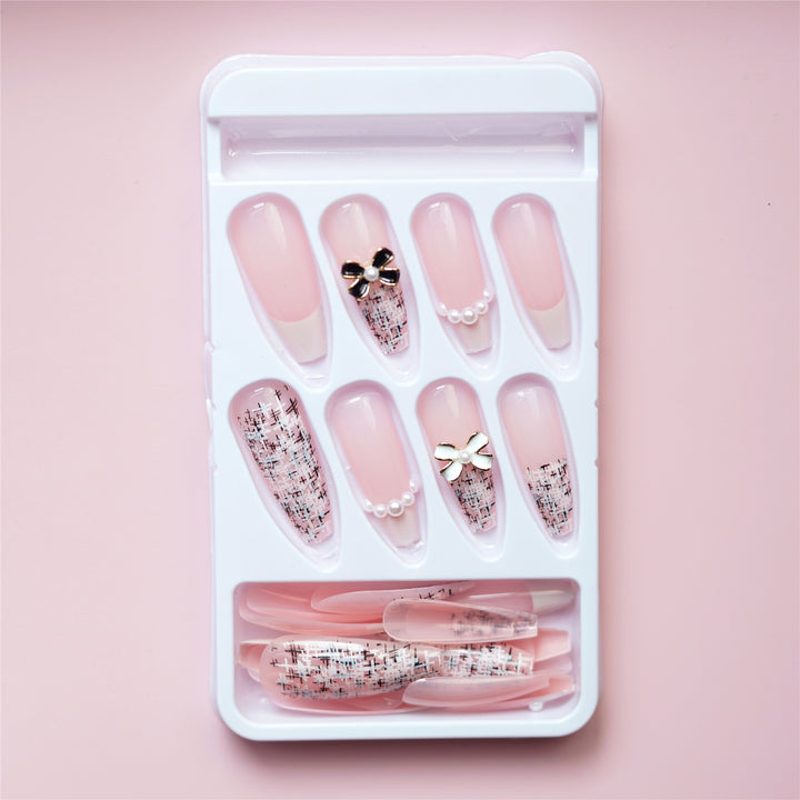 Elegant Press-On Nail Art with Decorative Bow Accents