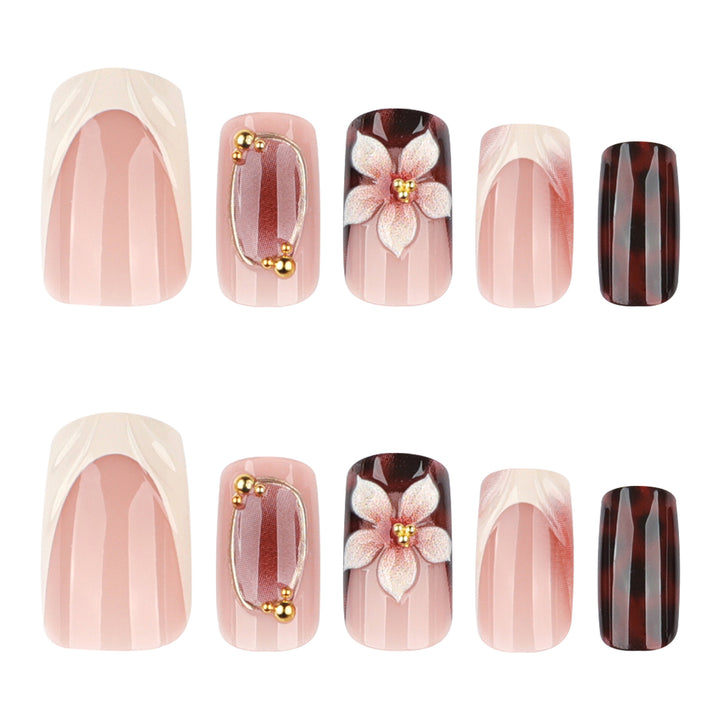 Artistic stiletto nails with elegant floral design and glitter effects Kalsten