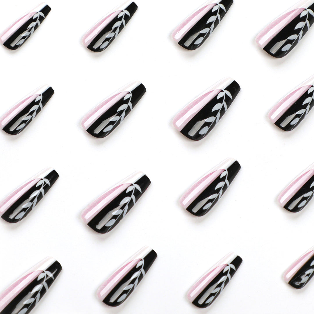 Artful nail extensions in elegant black and white design Kalsten