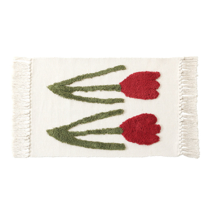 Decorative cotton bath mat with fringes and textured floral border