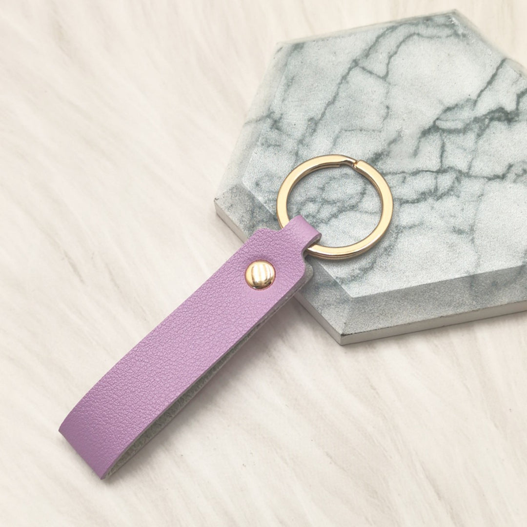 Unisex keychain made of high-quality synthetic leather with elegant metal embellishment Kalsten