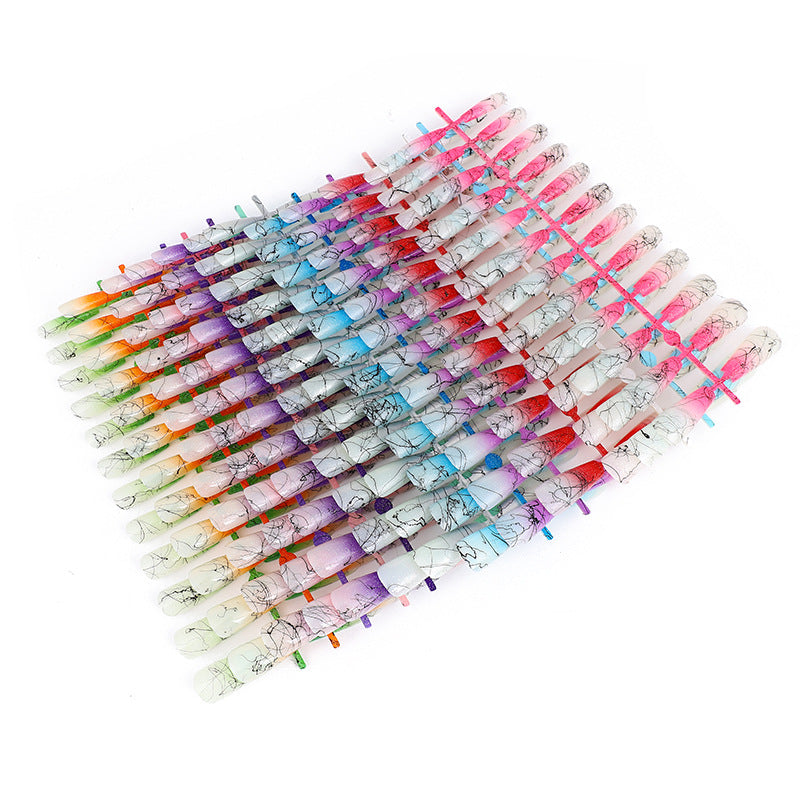Artificial nails in modern ombre design with marbled accents Kalsten