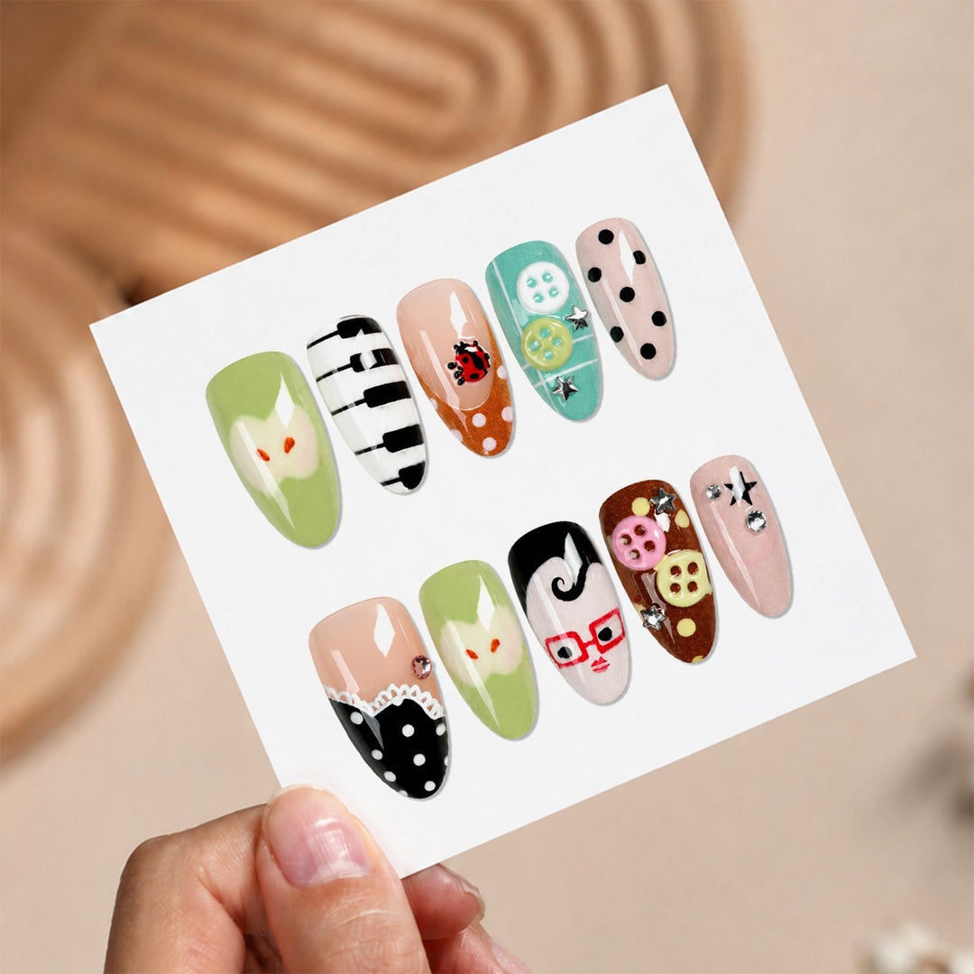 Creative nail art set with playful patterns and 3D details Kalsten
