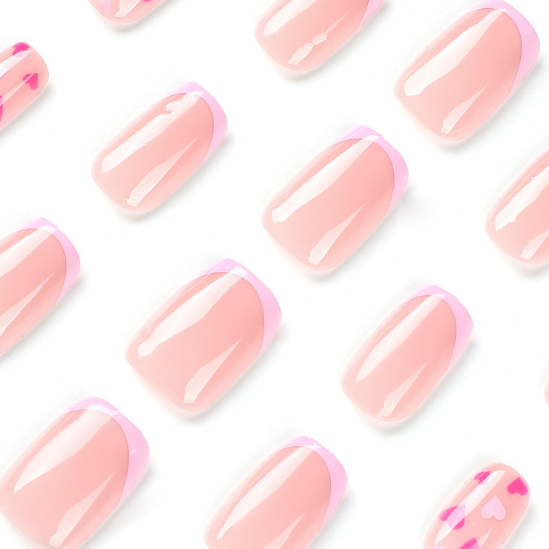 Elegant Nail Art with Heart Motifs Kalsten