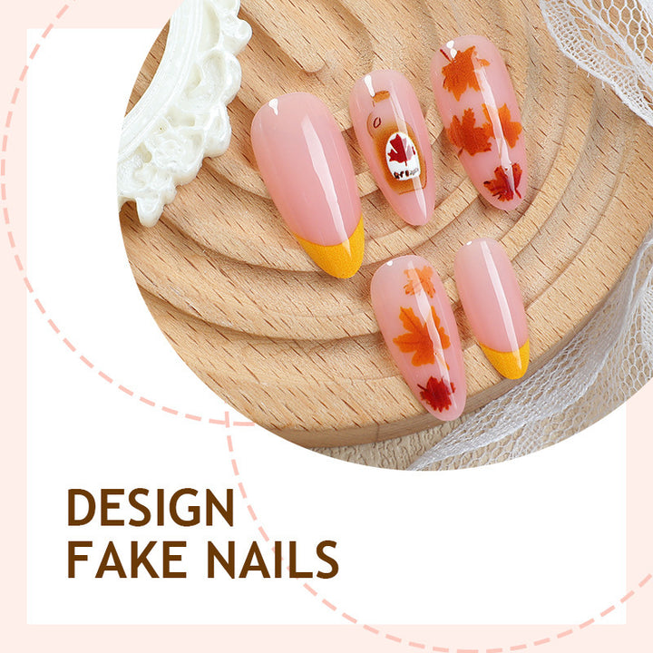Artificial nail set with autumn leaf decorations and elegant color gradients Kalsten