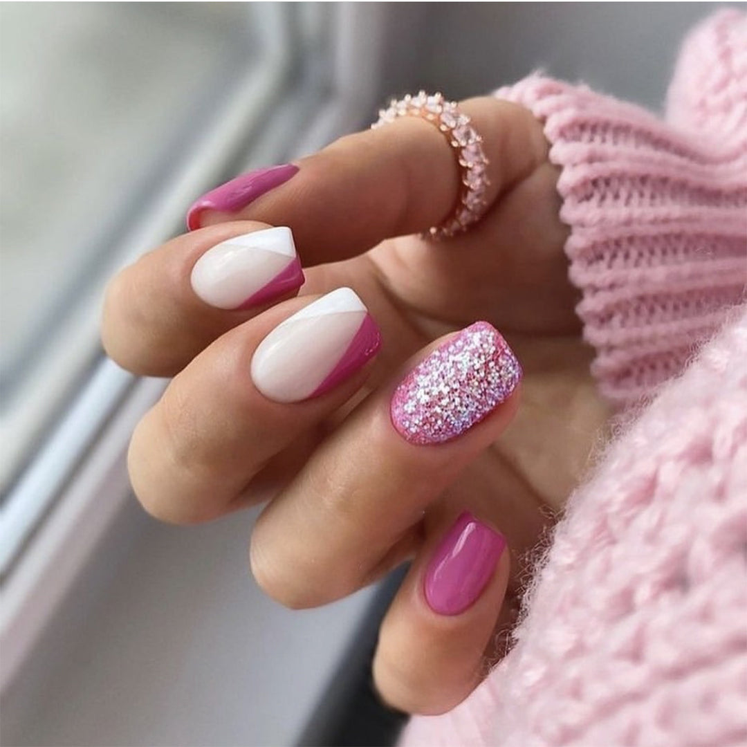 Artistic Nail Art with Glitter Accents and Ombre Design Kalsten