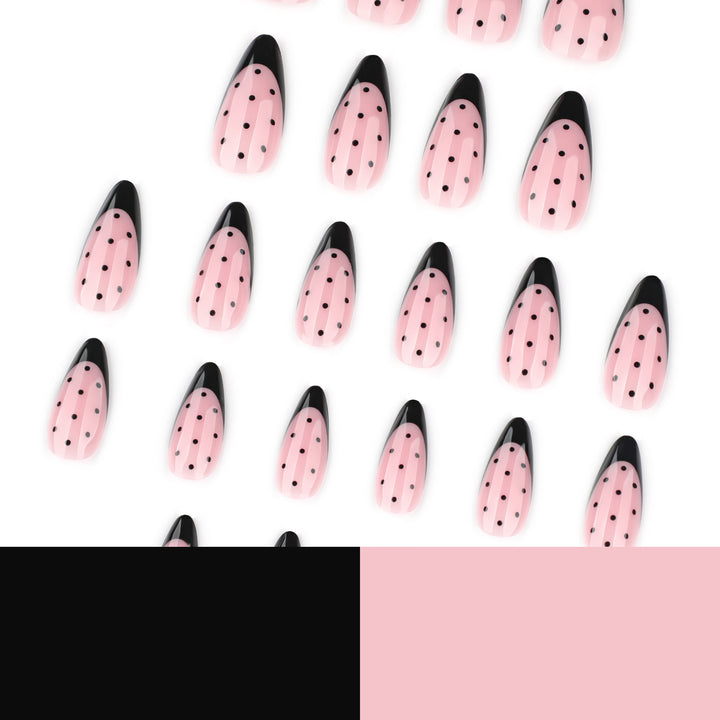 Artistic stiletto nails with black dot pattern Kalsten