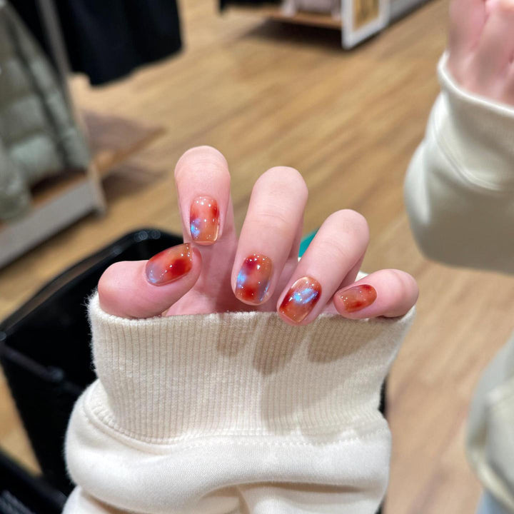 Artificial nails with shimmering galaxy patterns Kalsten