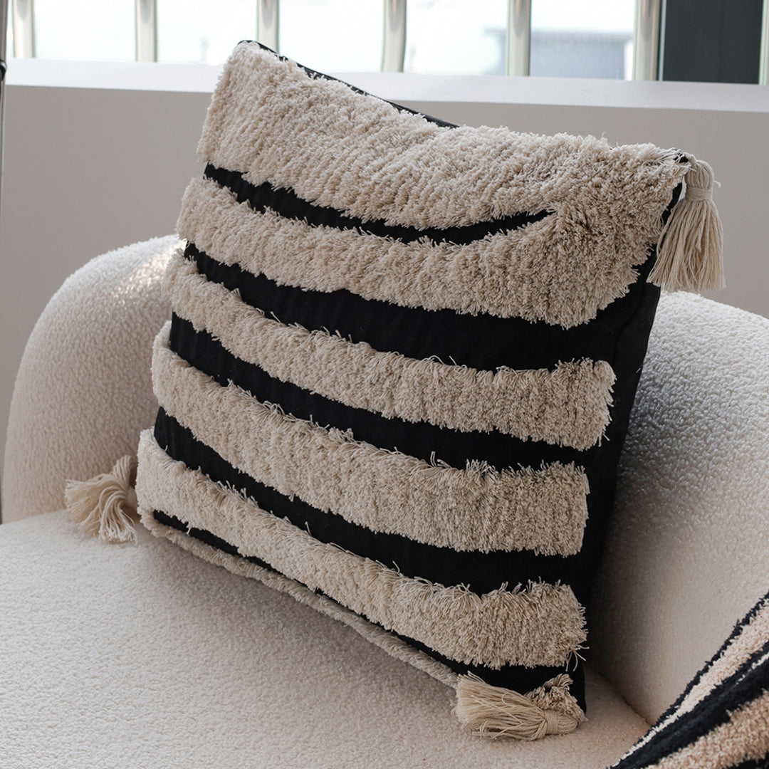 Square decorative cushion cover with hand-tufted ethnic appliqué motif and fringed edge Kalsten