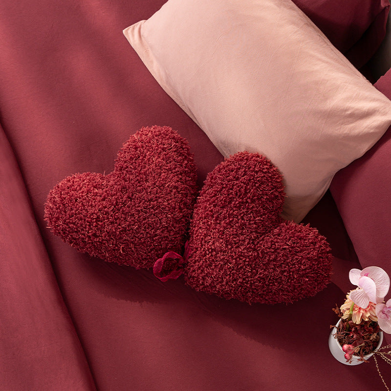 Heart-shaped decorative cushion set made of plush with ribbon and textured teddy surface Kalsten