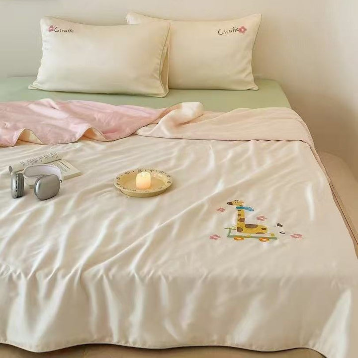 Children's satin bedding set with embroidered bunny moon and silky reversible throw