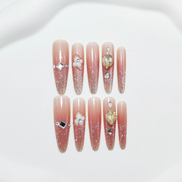 Shiny artificial nails with rhinestones and glitter Kalsten