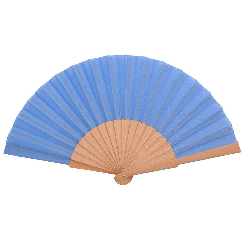 Ladies folding hand fan made of airy material with intricate folds Kalsten