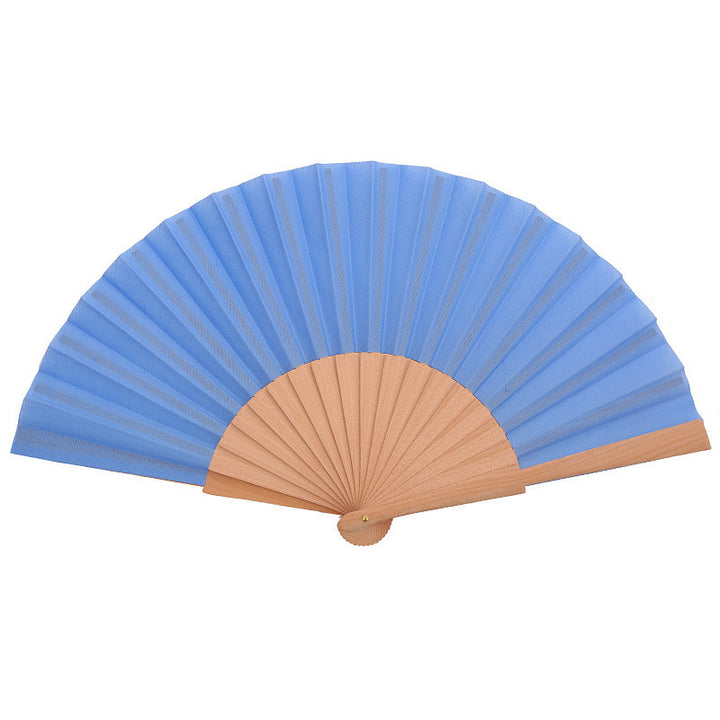 Ladies folding hand fan made of airy material with intricate folds Kalsten