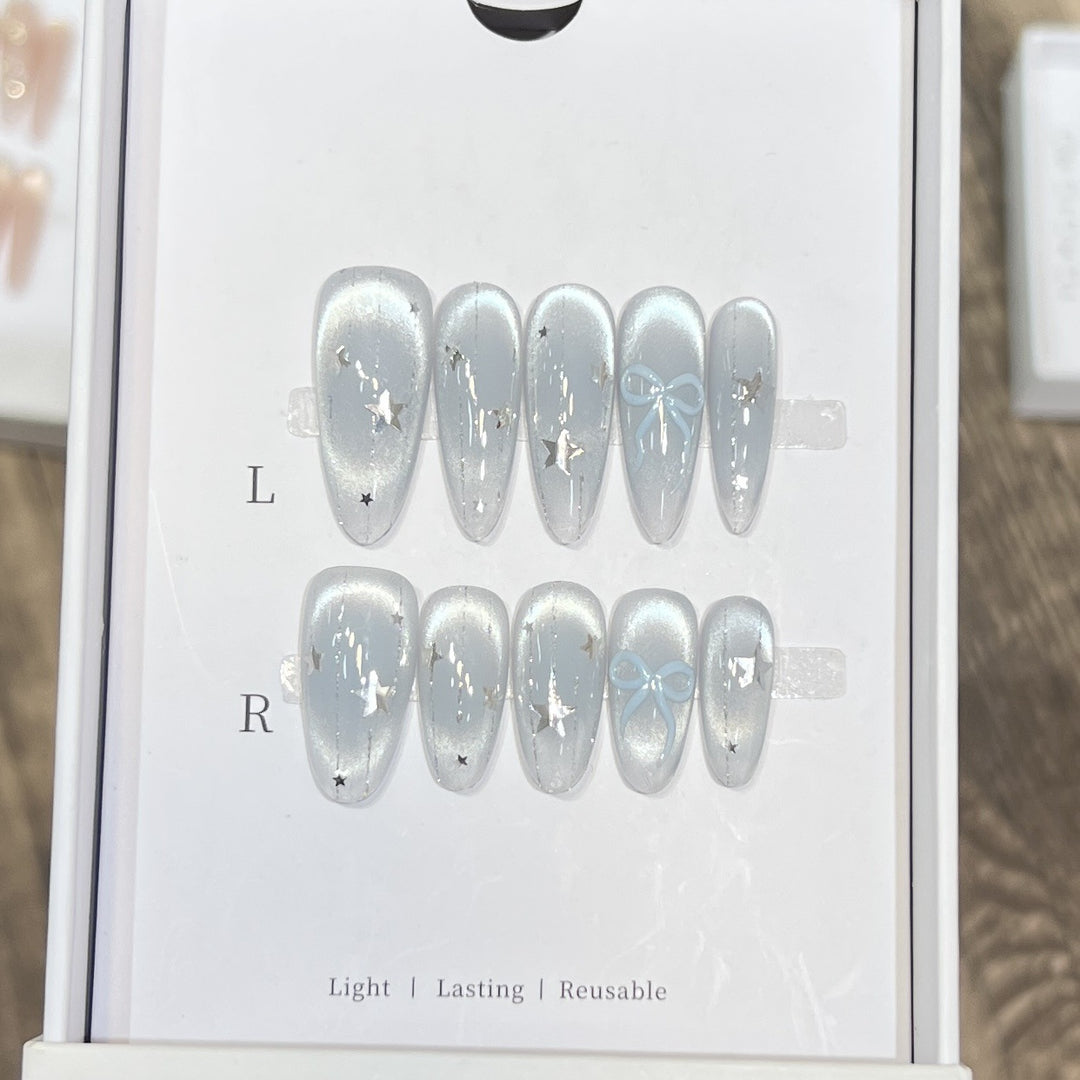 Decorative Stiletto Press-On Nail Set with Star and Bow Accents Kalsten