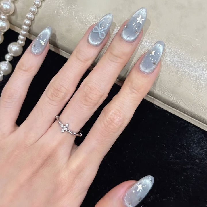 Decorative Stiletto Press-On Nail Set with Star and Bow Accents Kalsten