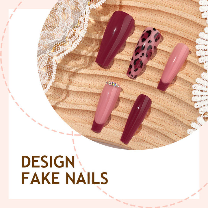 Artificial nail set with elegant animal print and glitter accents Kalsten
