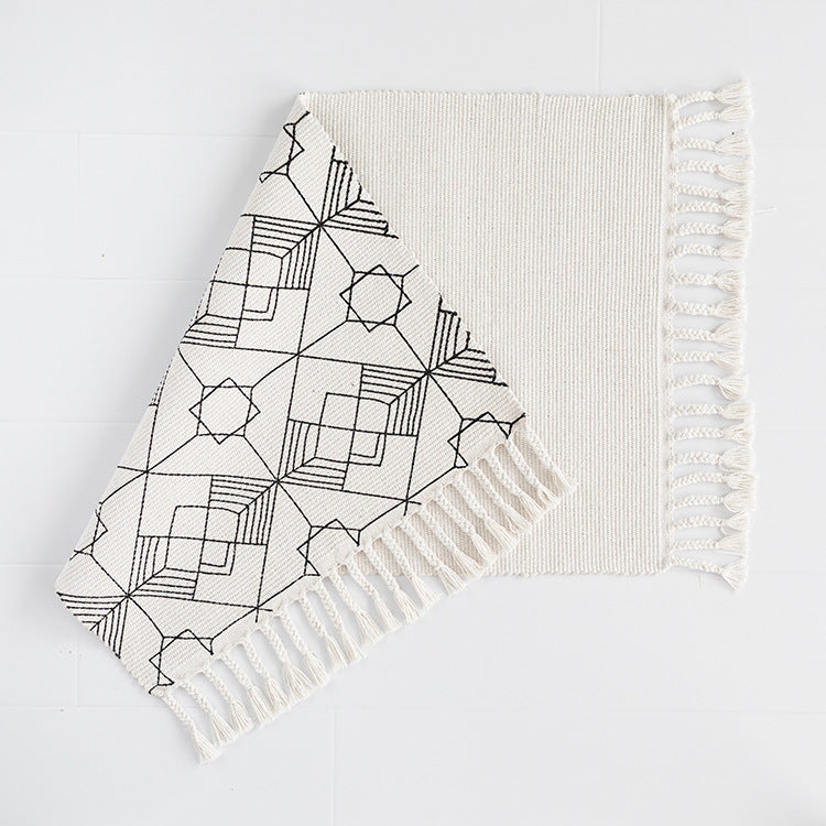 Flat-woven entrance runner made of cotton blend with geometric tile pattern and fringes Kalsten