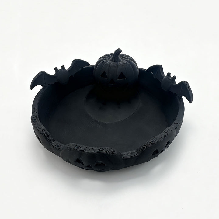 Halloween decorative bowl with carved pumpkin and bat appliqué