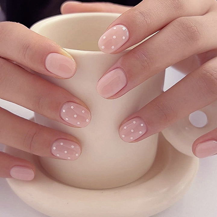 Artful Nail Art with Delicate Dot Design Kalsten
