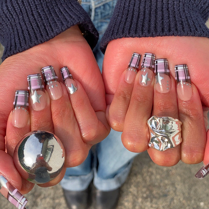 Artificial nails in modern check pattern with glitter and star details Kalsten