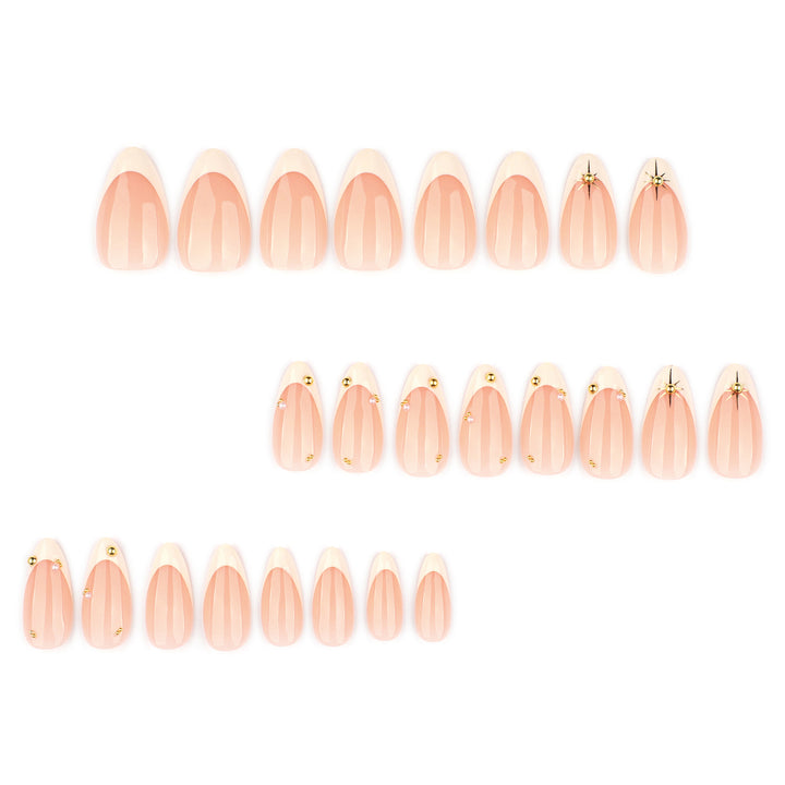 Artistic French-tip nail art with glitter and elegant embellishments Kalsten