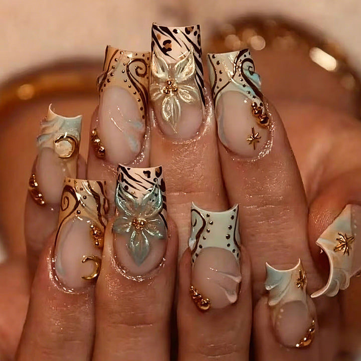 Art nail set with elegant floral and geometric accents Kalsten