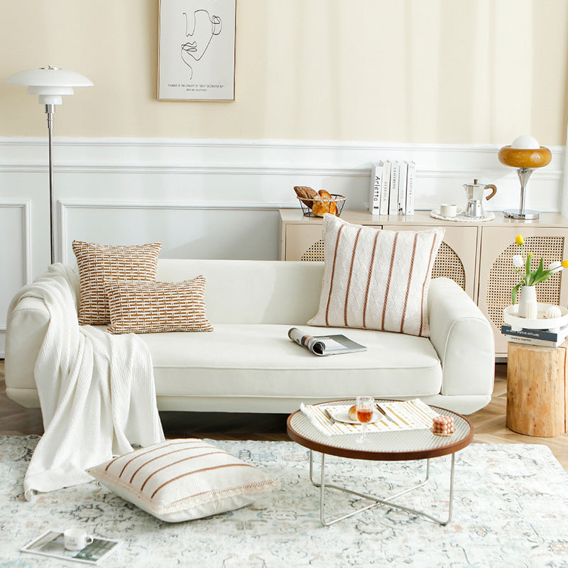 Knitted cushion cover with vertical texture rib and crochet border