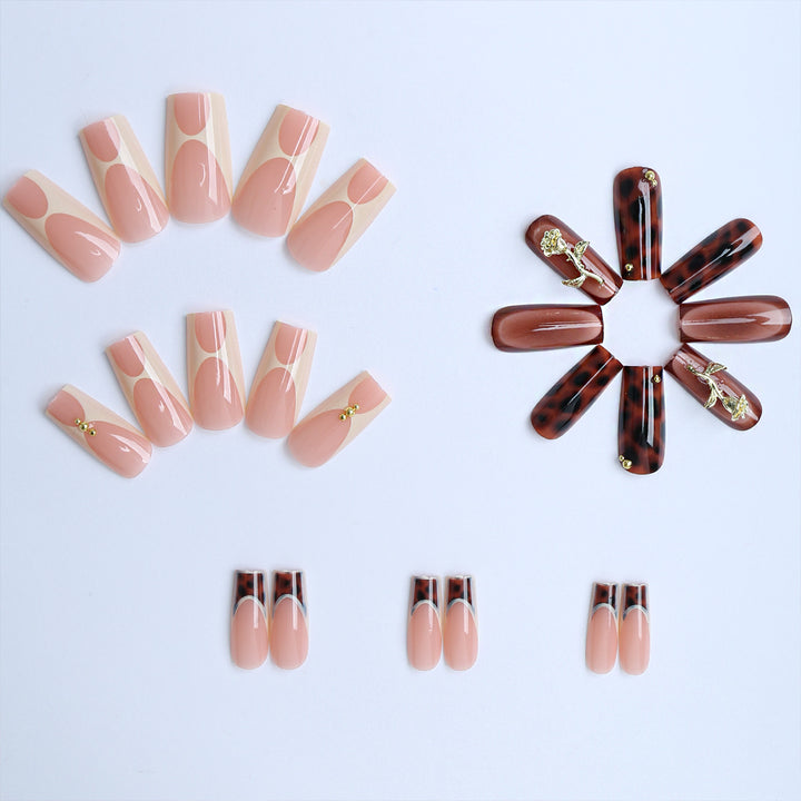 Artificial nails with luxurious embellishments and animalistic design Kalsten