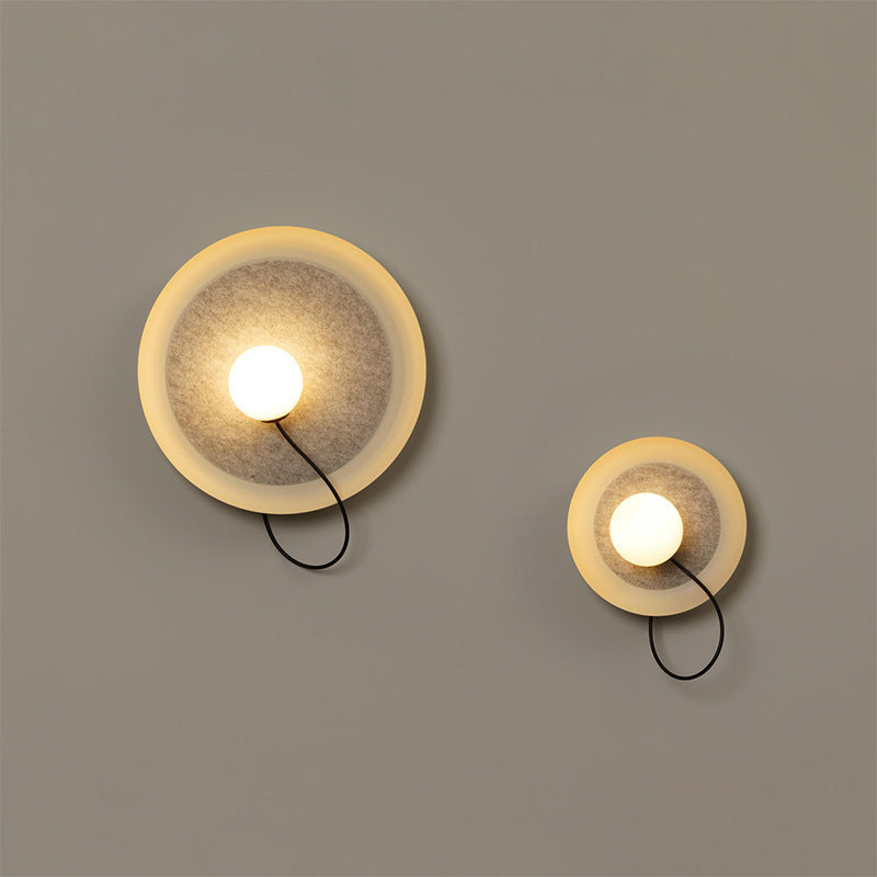 Modern Wall Sconce with Fabric Backdrop and Soft Glow