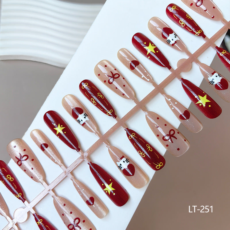 Artificial nails in festive Christmas design Kalsten