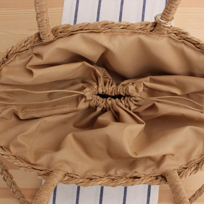 Fashionable basket bag with elegant tassel design Kalsten