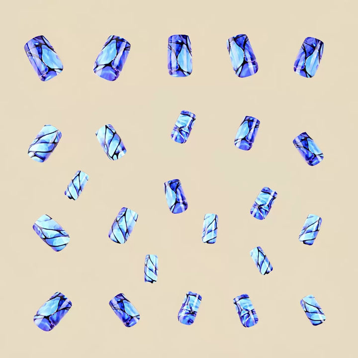 Acrylic nail set with luxurious marble design and elegant accents Kalsten