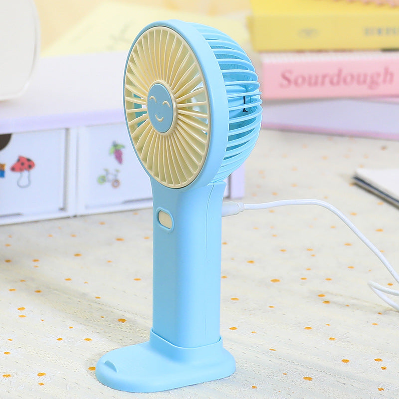 Ladies portable USB hand fan with innovative smiling design Kalsten