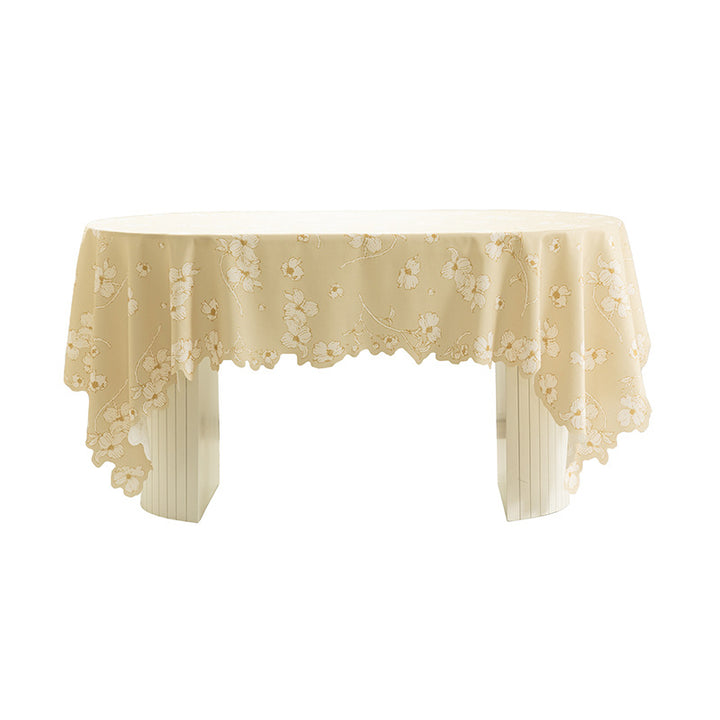 Round wipeable tablecloth with floral cut-out hem Kalsten