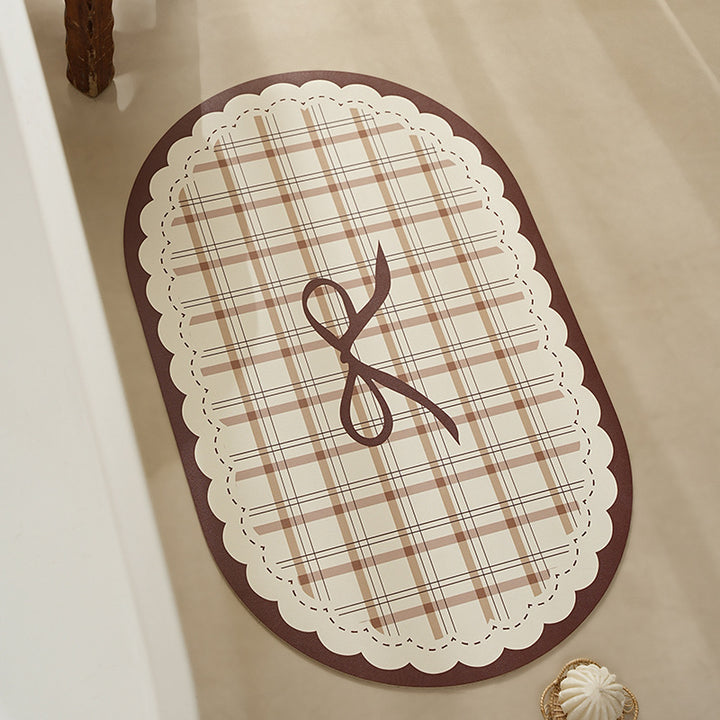 Rectangular wipeable placemat with checked pattern, wavy decorative edge and bow motif Kalsten
