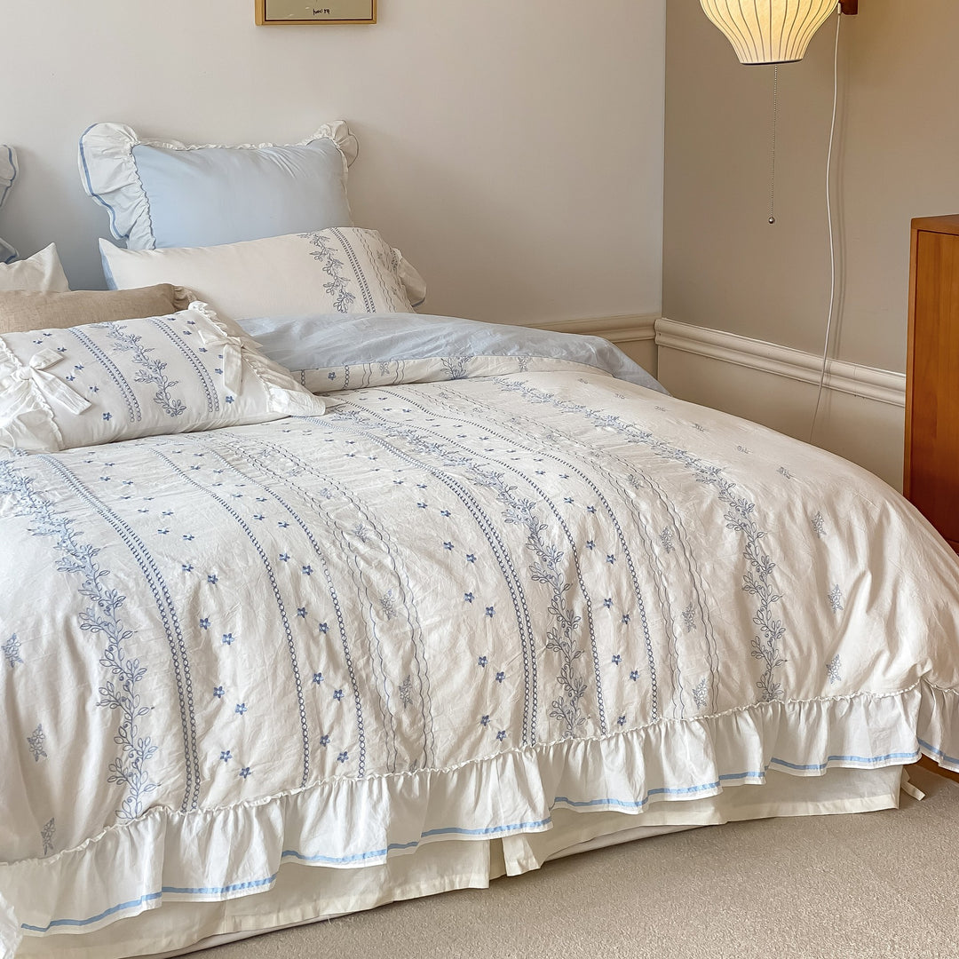 Country house bed set made of cotton with embroidery detail, ruffled edge and integrated bed skirt