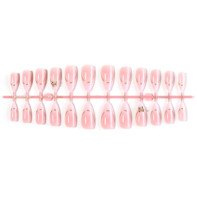 Artificial nail set with elegant gold edge and decorative accents Kalsten