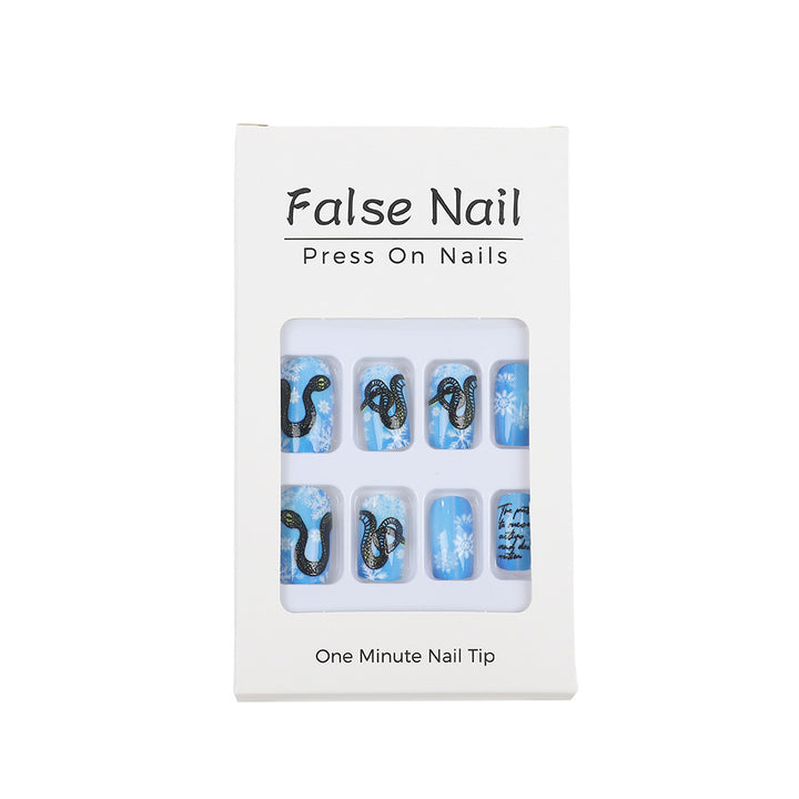 Creative art nails with snowflake and snake motif Kalsten