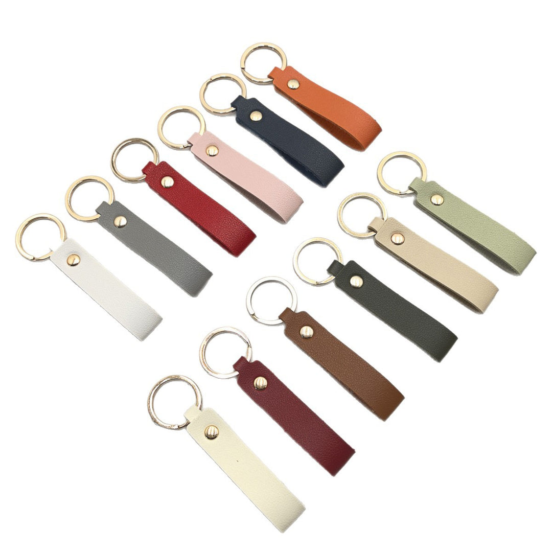 Unisex keychain made of high-quality synthetic leather with elegant metal embellishment Kalsten
