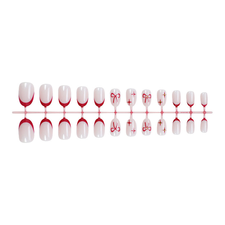 Acrylic nail set with elegant arch design and glitter effects Kalsten