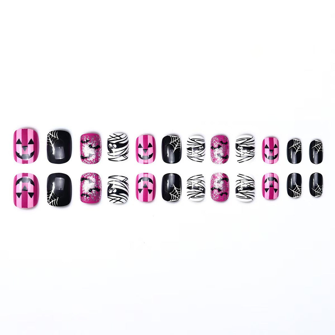 Creative nail art set with Halloween motifs and glitter accents Kalsten