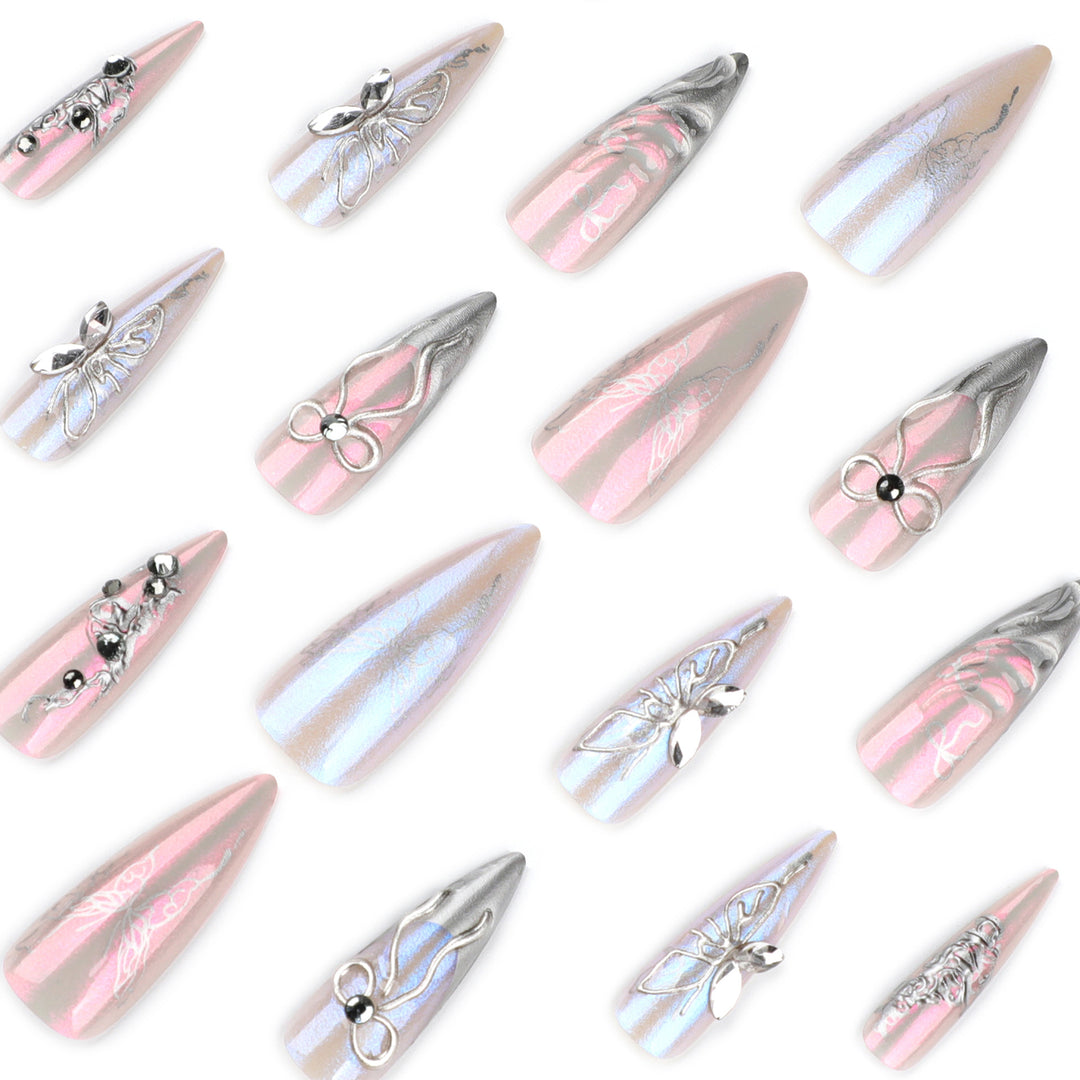 Artful stiletto nails with delicate silver casting decoration Kalsten