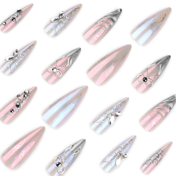Artful stiletto nails with delicate silver casting decoration Kalsten