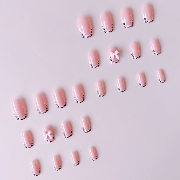 Artificial nail set with elegant leopard design and cute bows Kalsten