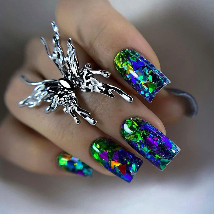 Artificial nails with sparkling glitter design and holographic accents Kalsten